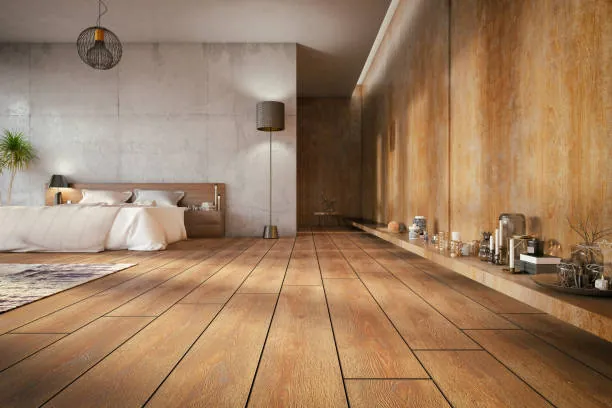 Bedroom with wood panelling and matching timber flooring