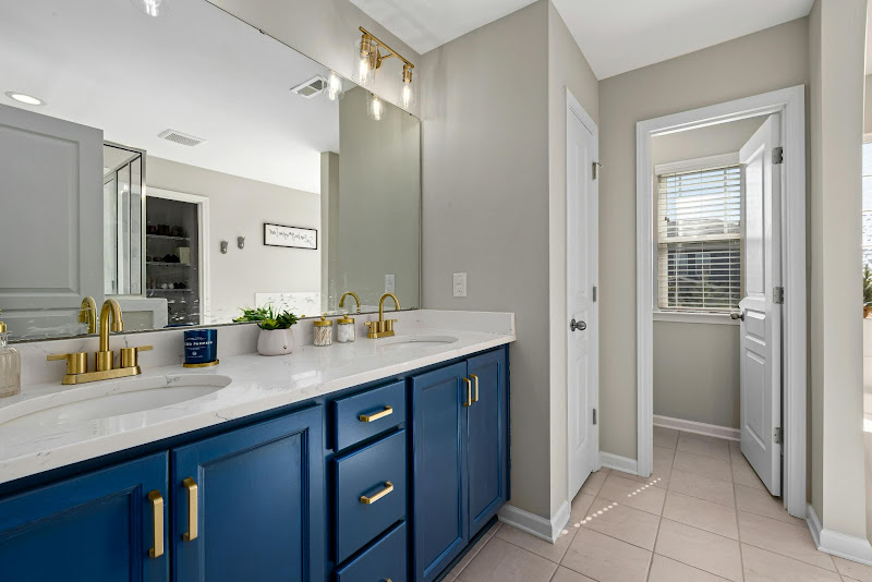 A clean minimalist kitchen after a post-renovation deep cleaning.